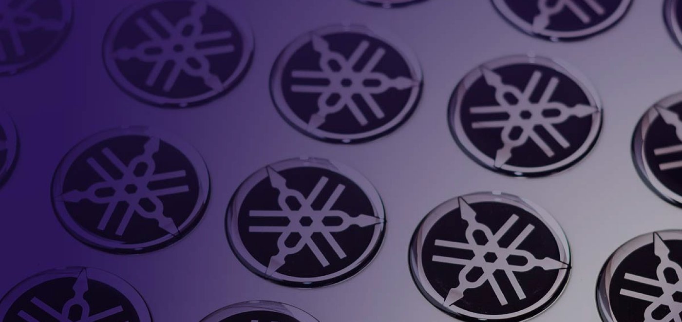 Sheet of Yamaha domed logos